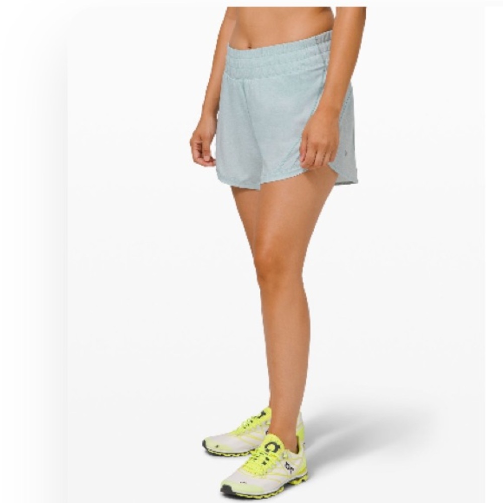 Lululemon Track that mid-rise lined 5”
Size 8
Heather lux multi hazy jade